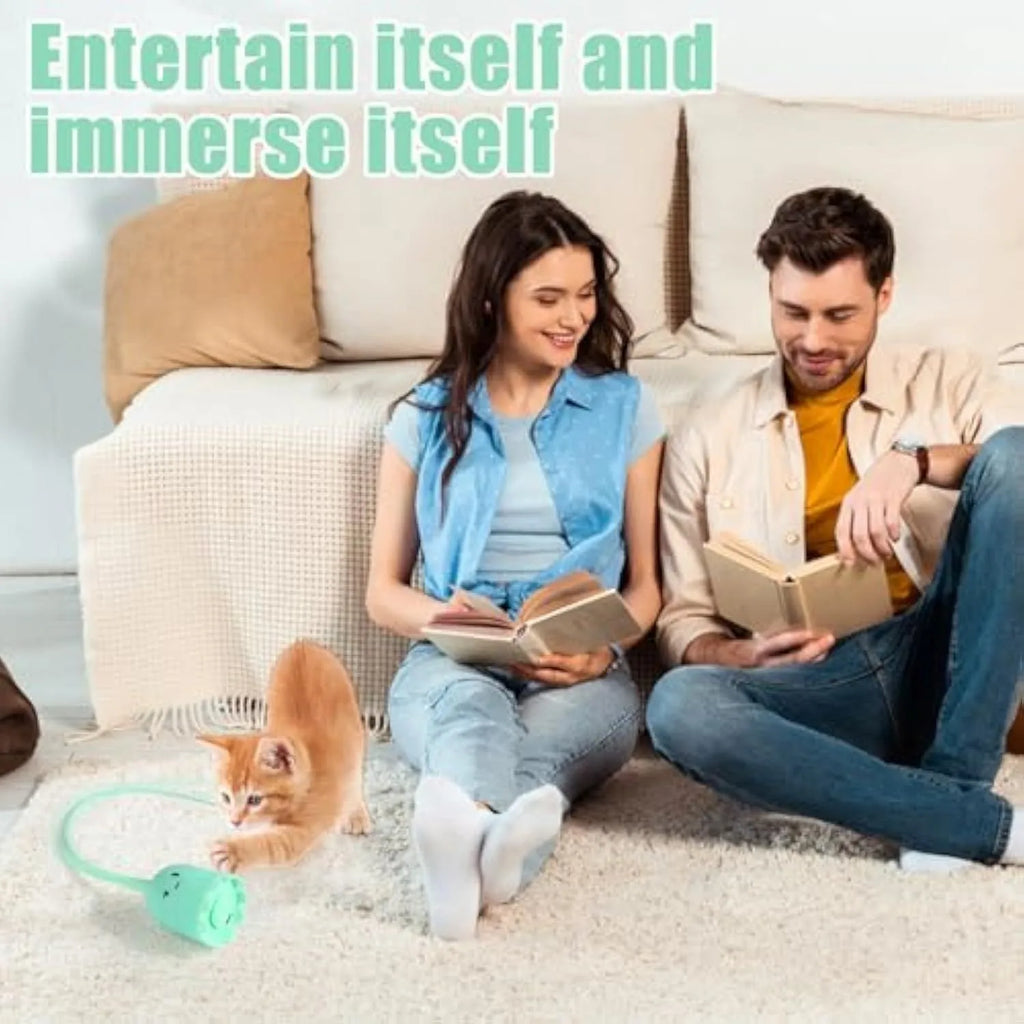 Automatic electronic cat toy wand with green silicone tails swinging in motion