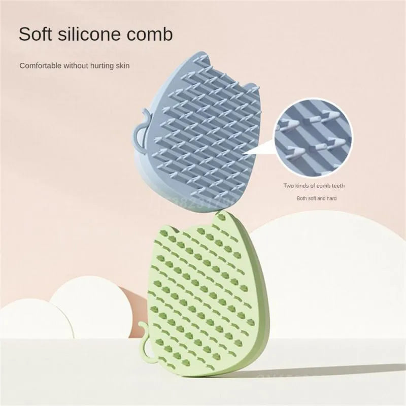 Blue sponge silicone pet comb brush with dual soft and hard bristles for cat and dog grooming.