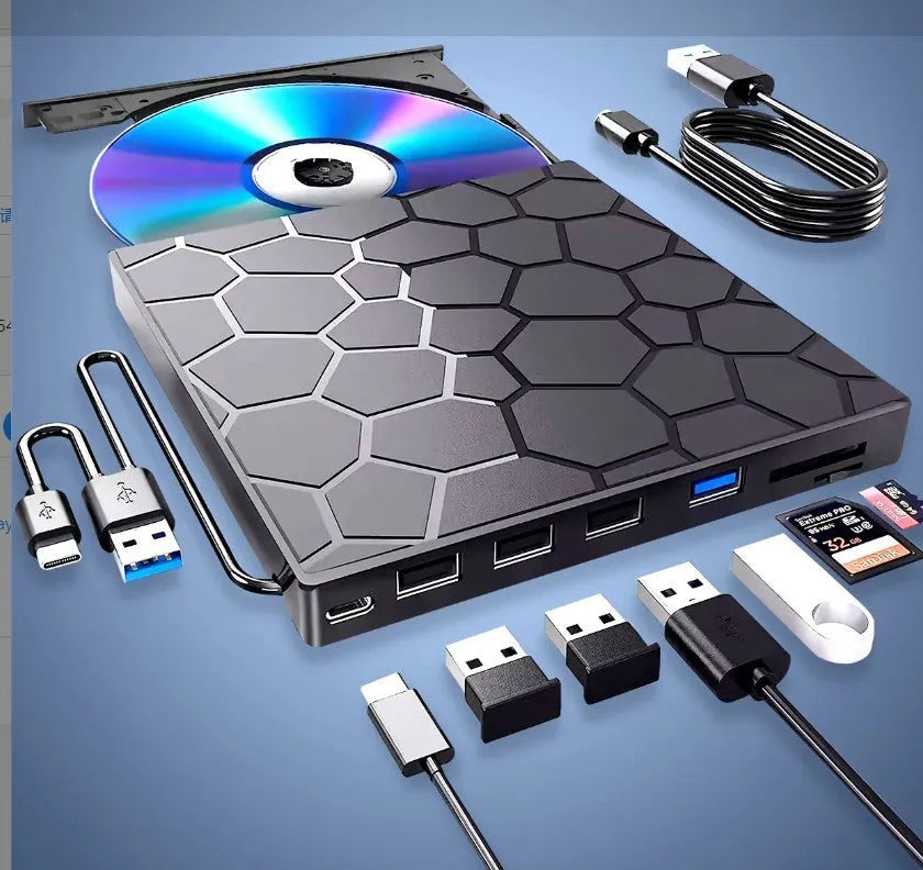 Black external USB CD DVD drive optical disc writer reader burner on a desk.