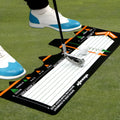 Black neoprene golf swing stance practice pad with alignment markers for posture correction.