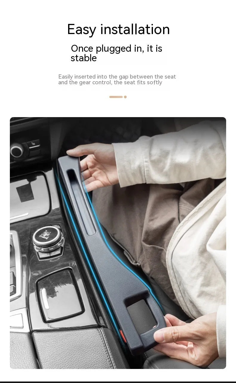 Black plastic car seat gap storage organiser box with a handle.
