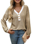 Women's loose-fitting apricot V-neck pullover top with button detail and patchwork design on long sleeves.