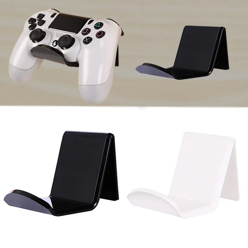 A universal plastic wall mount bracket for game controllers, shown in black colour