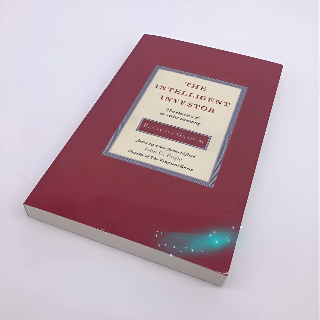 Paperback cover of The Intelligent Investor book by Benjamin Graham with Jason Zweig commentary