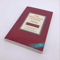 Paperback cover of The Intelligent Investor book by Benjamin Graham with Jason Zweig commentary