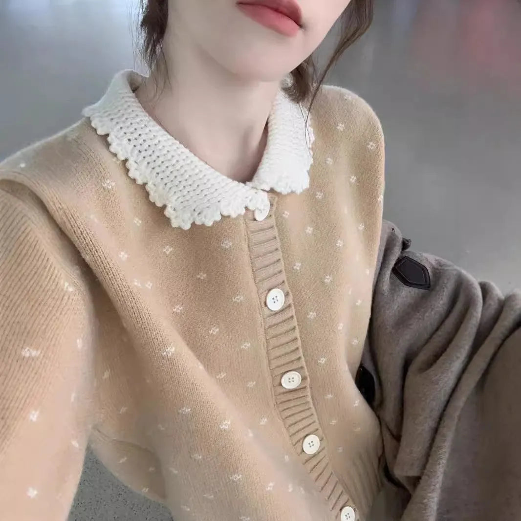 Knitted cardigan coat with Peter Pan collar in navy blue with floral pattern