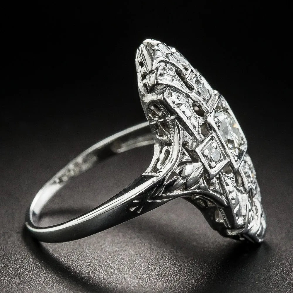 Silver electroplated copper ring with hollow-out geometry pattern and diamond studded detailing