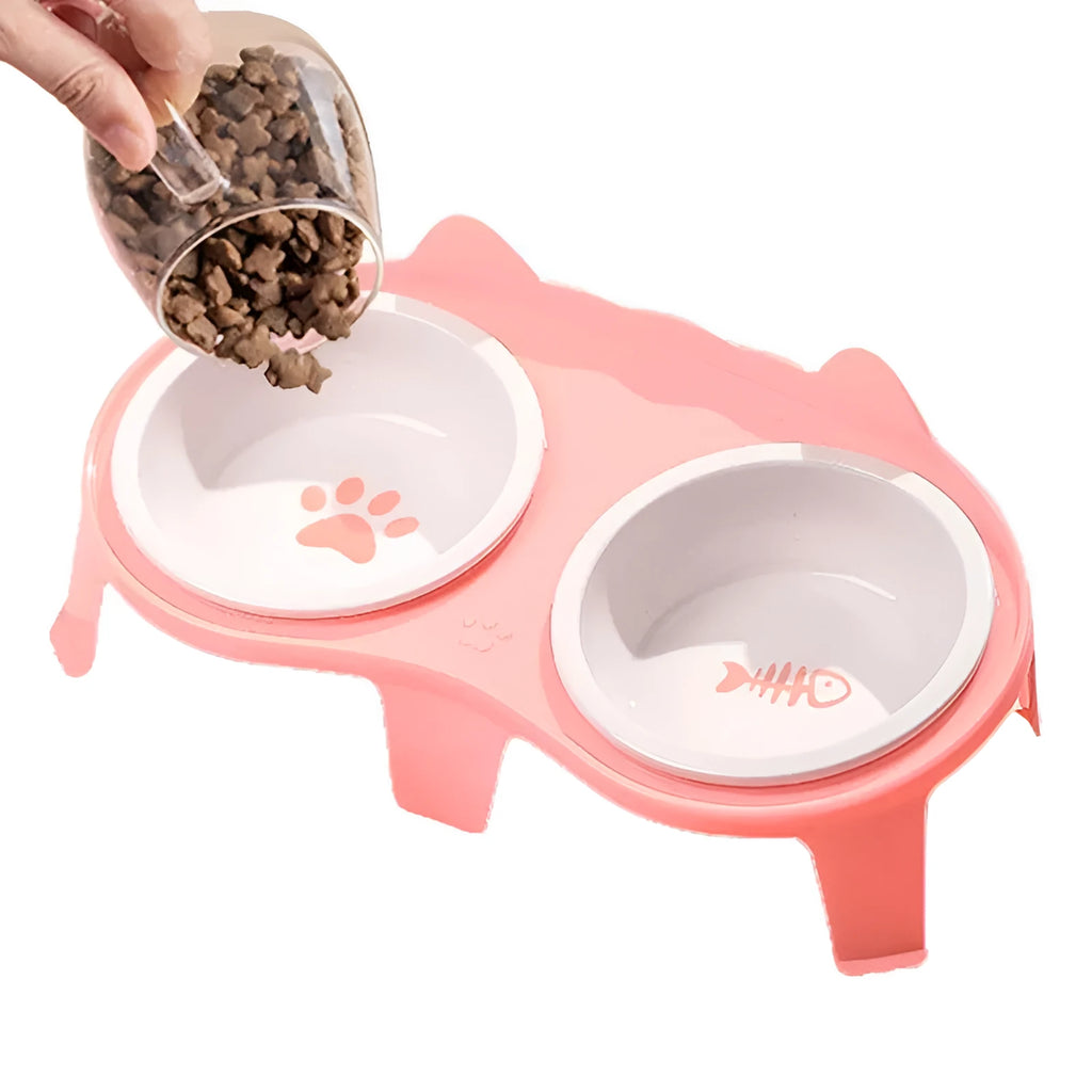 Blue ceramic cat food and water bowls sitting in a white elevated tilted stand with a hook
