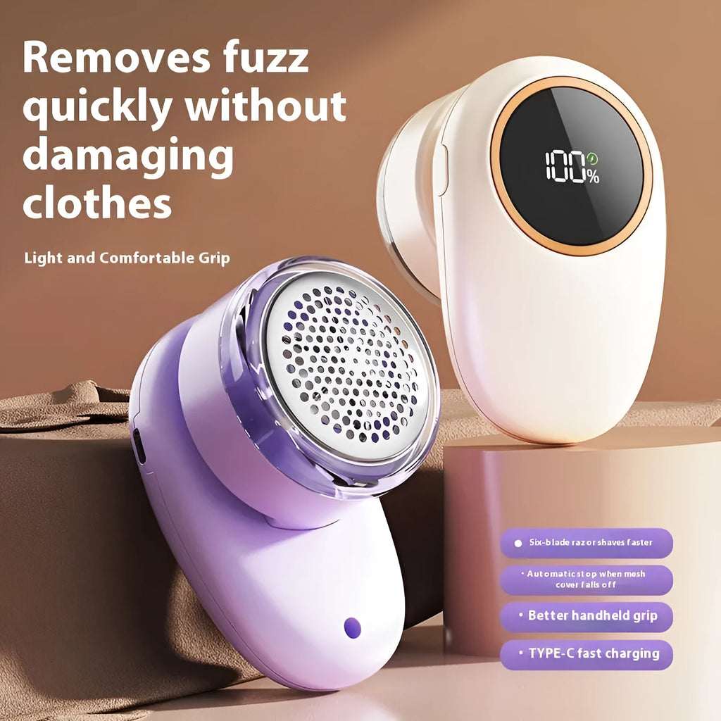 Beige and purple rechargeable pet hair trimmer with digital display and replacement cutter heads on a table.