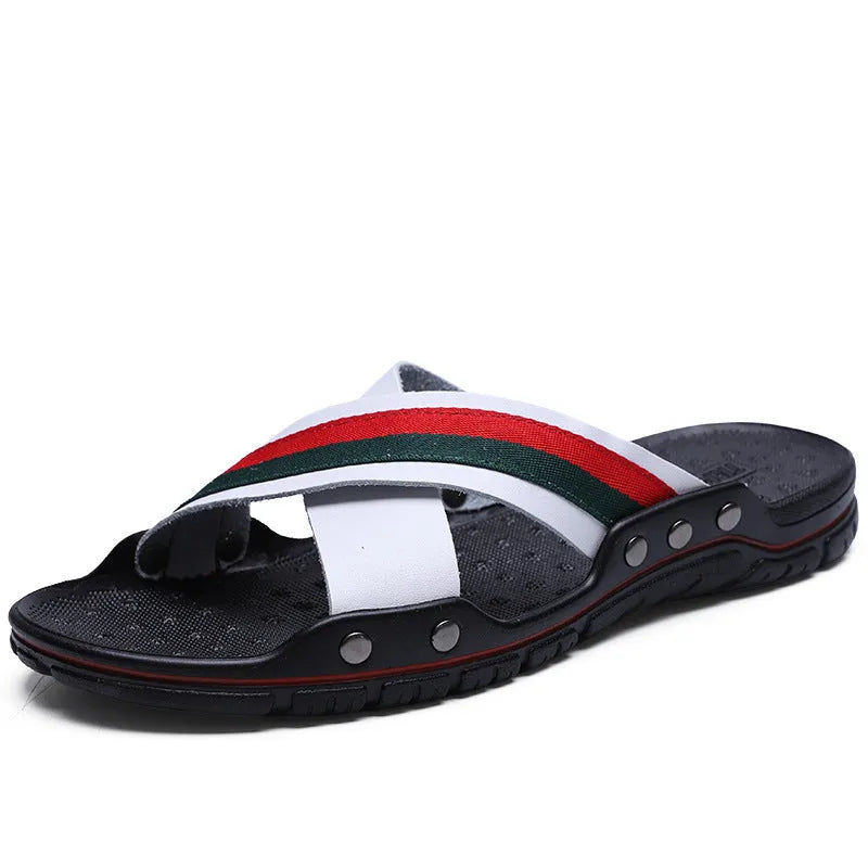 Men's white cowhide leather flip-flops with a non-slip PU sole, shown on a beach background