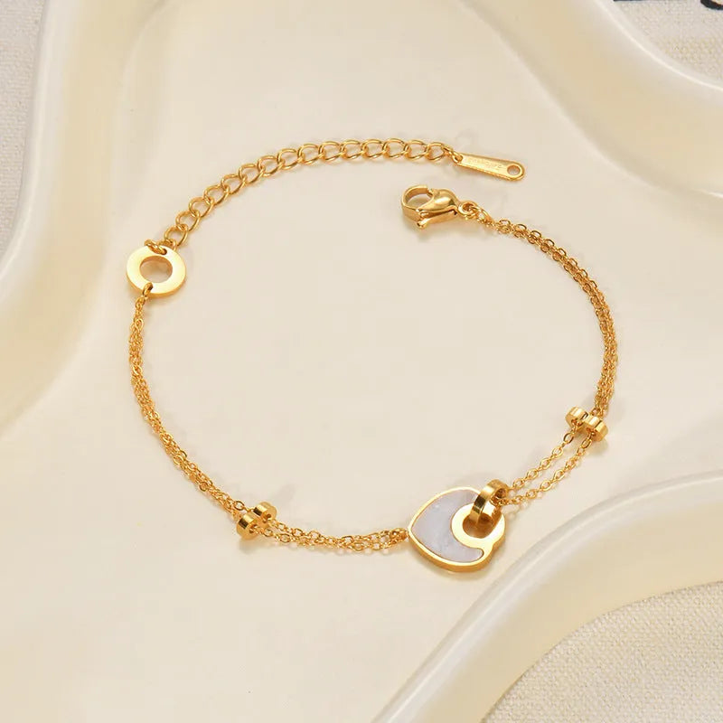Women's stainless steel resin bracelet with double-layer heart design and electroplated metallic finish