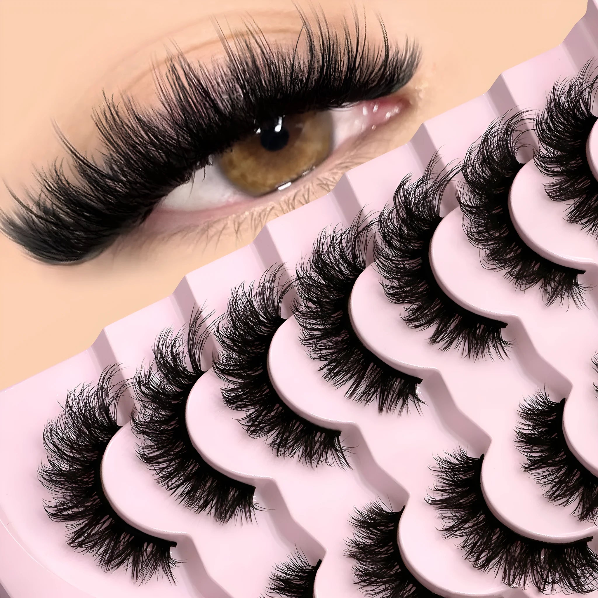 Box of artificial fibre false eyelashes in a natural long thick style with a tube of adhesive glue