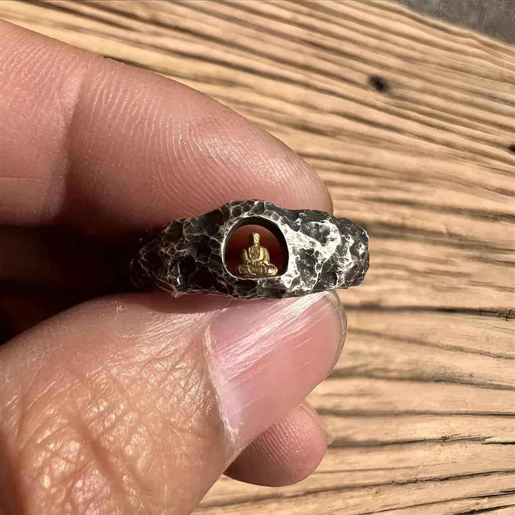 Hand-forged copper Grotto Buddha ring with rock texture on a band, shown in size No. 8.