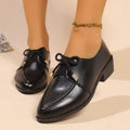 Women's British-style flat shoes with decorative bow, PU upper, and rubber sole in sizes 36-43.