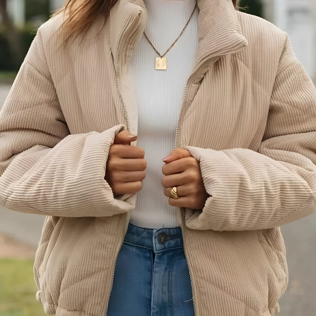 Women's Apricot corduroy zip-front jacket with a stand collar and wadded construction.