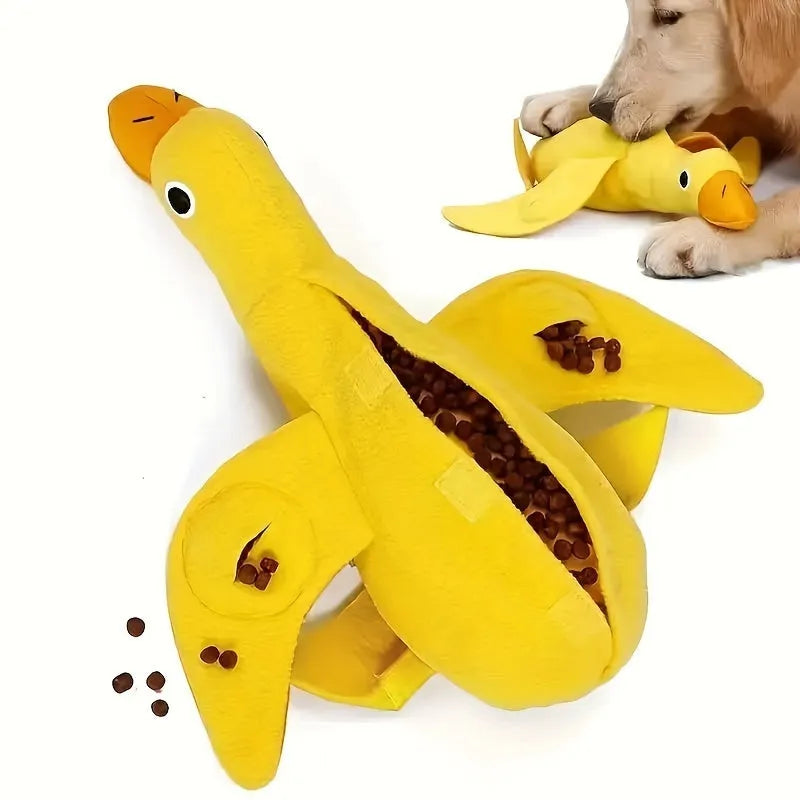 Yellow duck plush dog toy with a barking sound module for treat-dispensing play