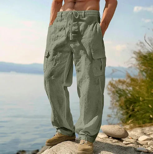 Men's cotton loose wide-leg trousers in light army green, laid flat