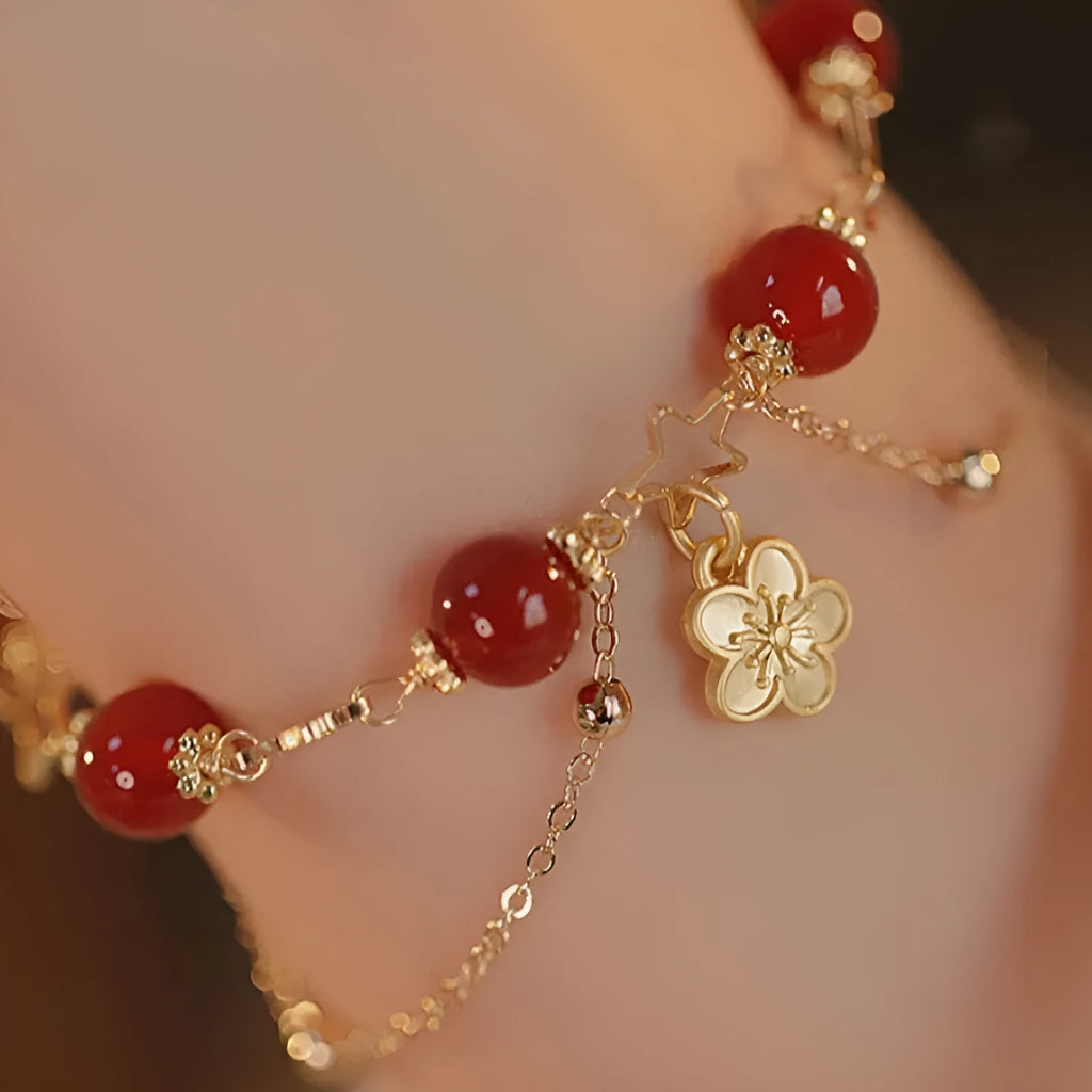 A red agate double layer bracelet with floral details for women.