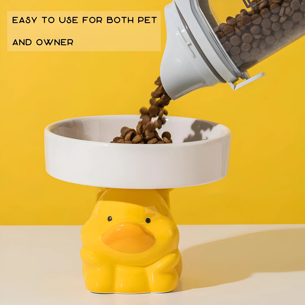 Raised ceramic cat bowl with animal theme design in pink, yellow, or white.