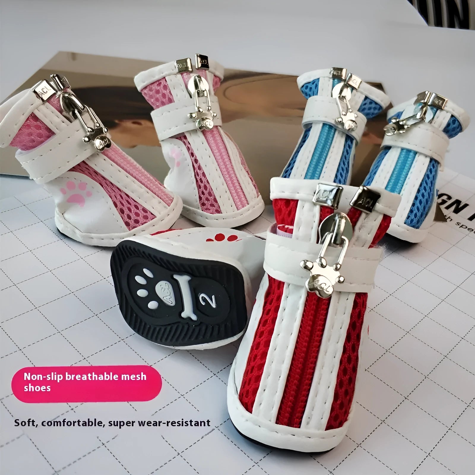 Set of four blue VIP Teddy Schnauzer zipper dog shoes for small dogs on a white background.
