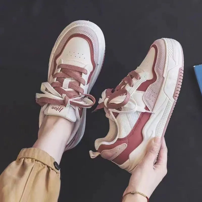 Pink and milky white low-top rubber sole sneakers with height increasing function