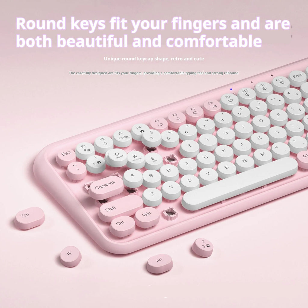 Pink wireless Bluetooth keyboard with 84 keys showing compact dimensions