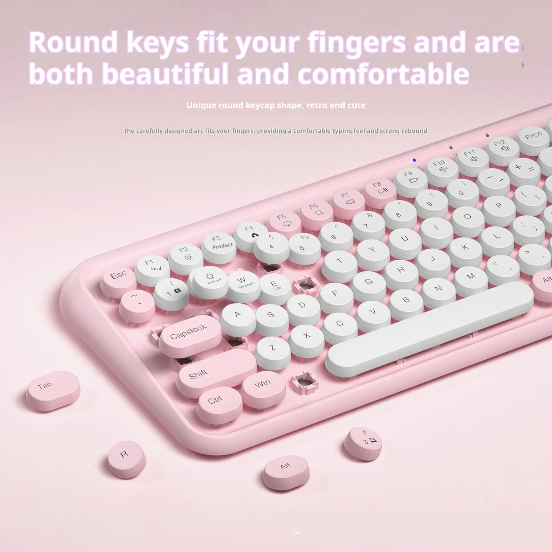 Pink wireless Bluetooth keyboard with 84 keys showing compact dimensions