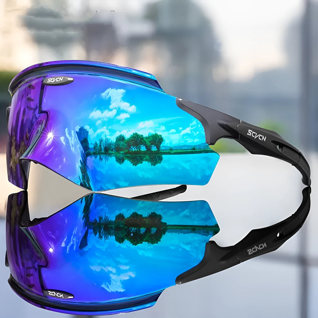 Frameless windproof sports goggles with a colourful integrated lens on a neutral background.