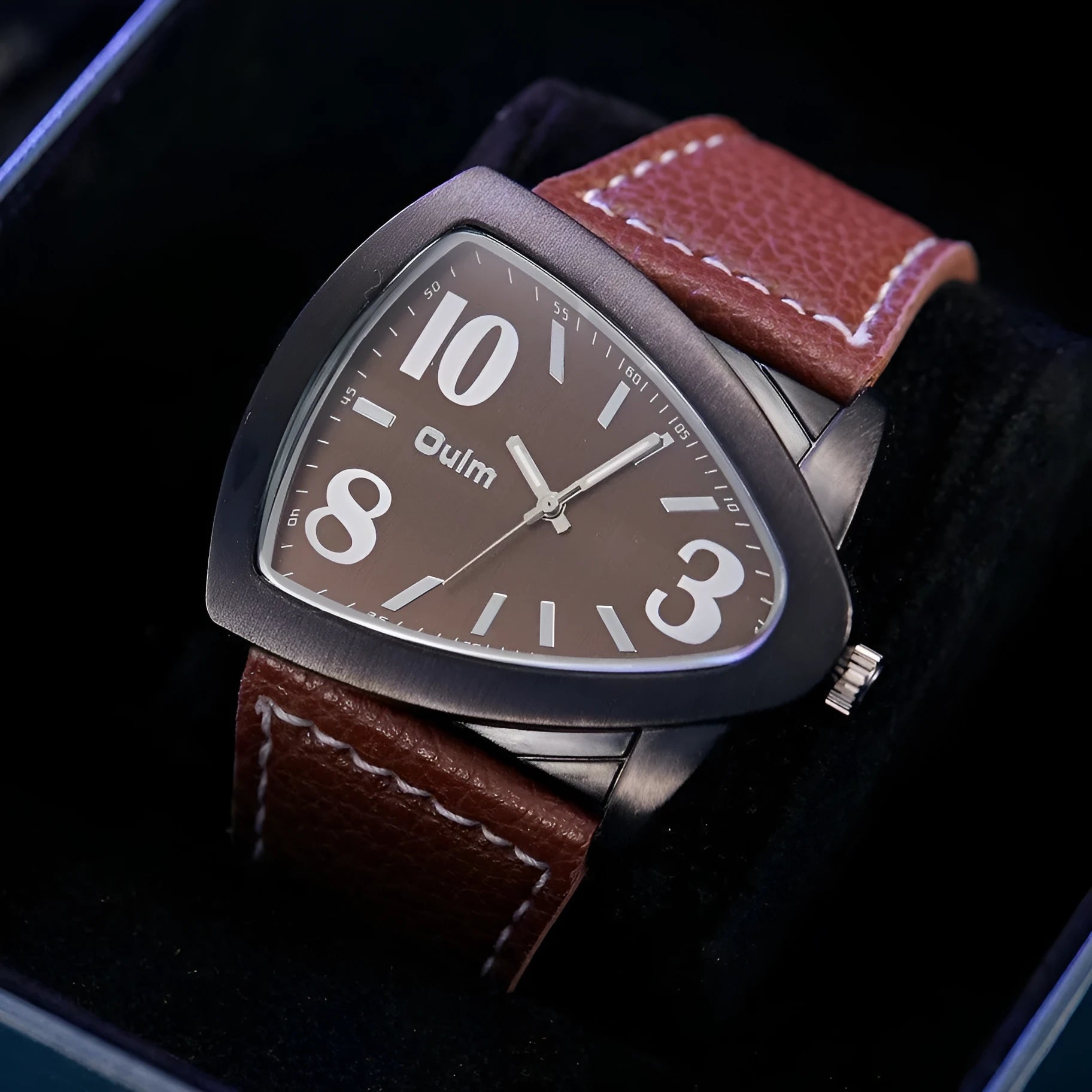 Men's casual watch with triangle pattern strap in choice of brown, black, or blue colour.