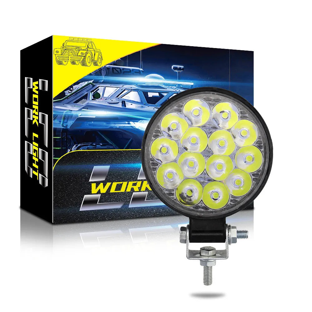White LED car work light with aluminium housing and round design