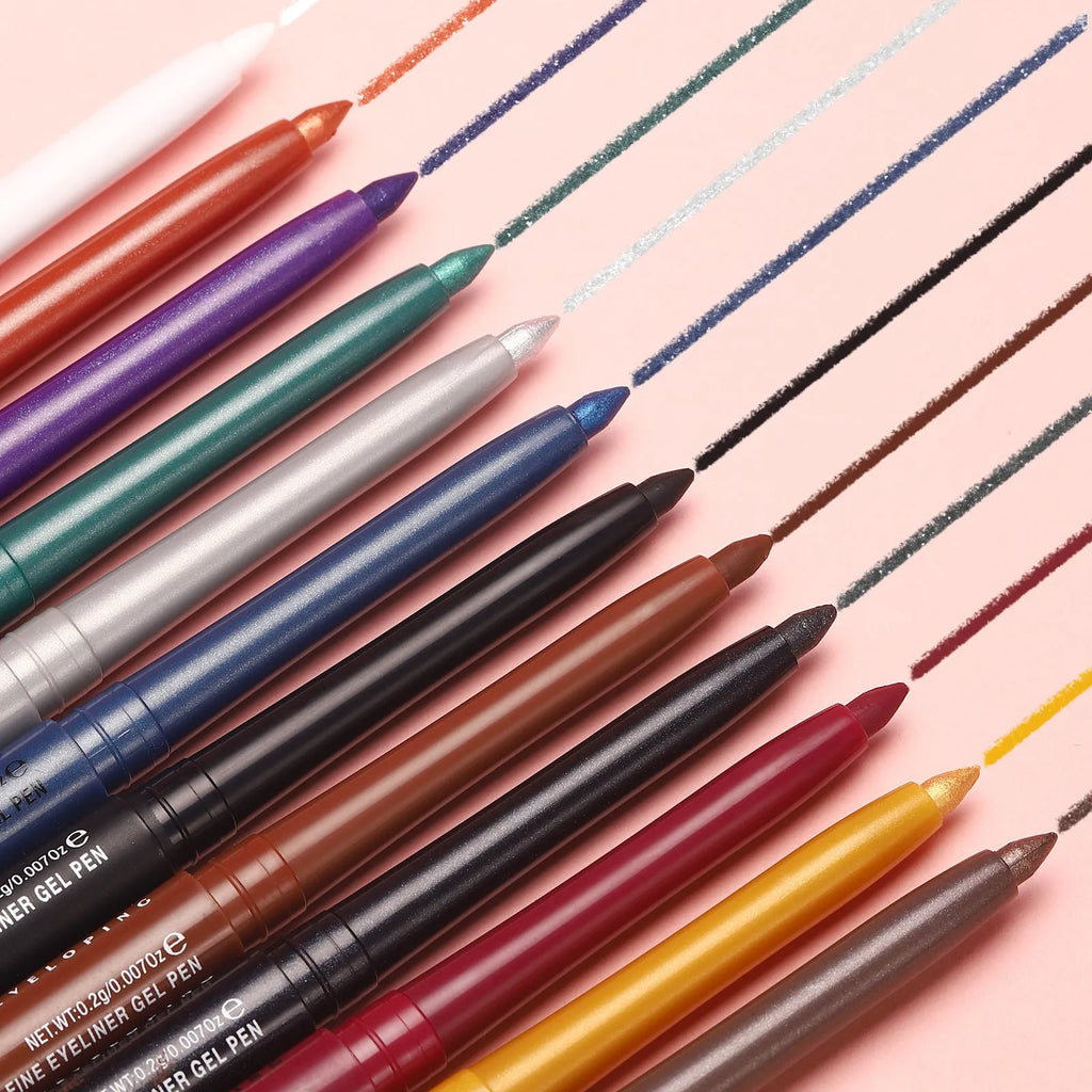 Set of 12 colourful gel eyeliner pencils with glitter, metallic, and matte tips displayed in a case.