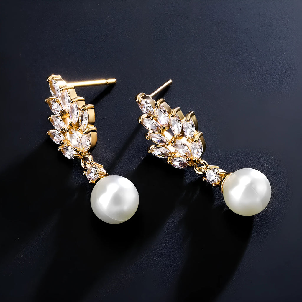 Geometric pearl earrings with micro inlaid zircon detailing and floral design in metallic plating