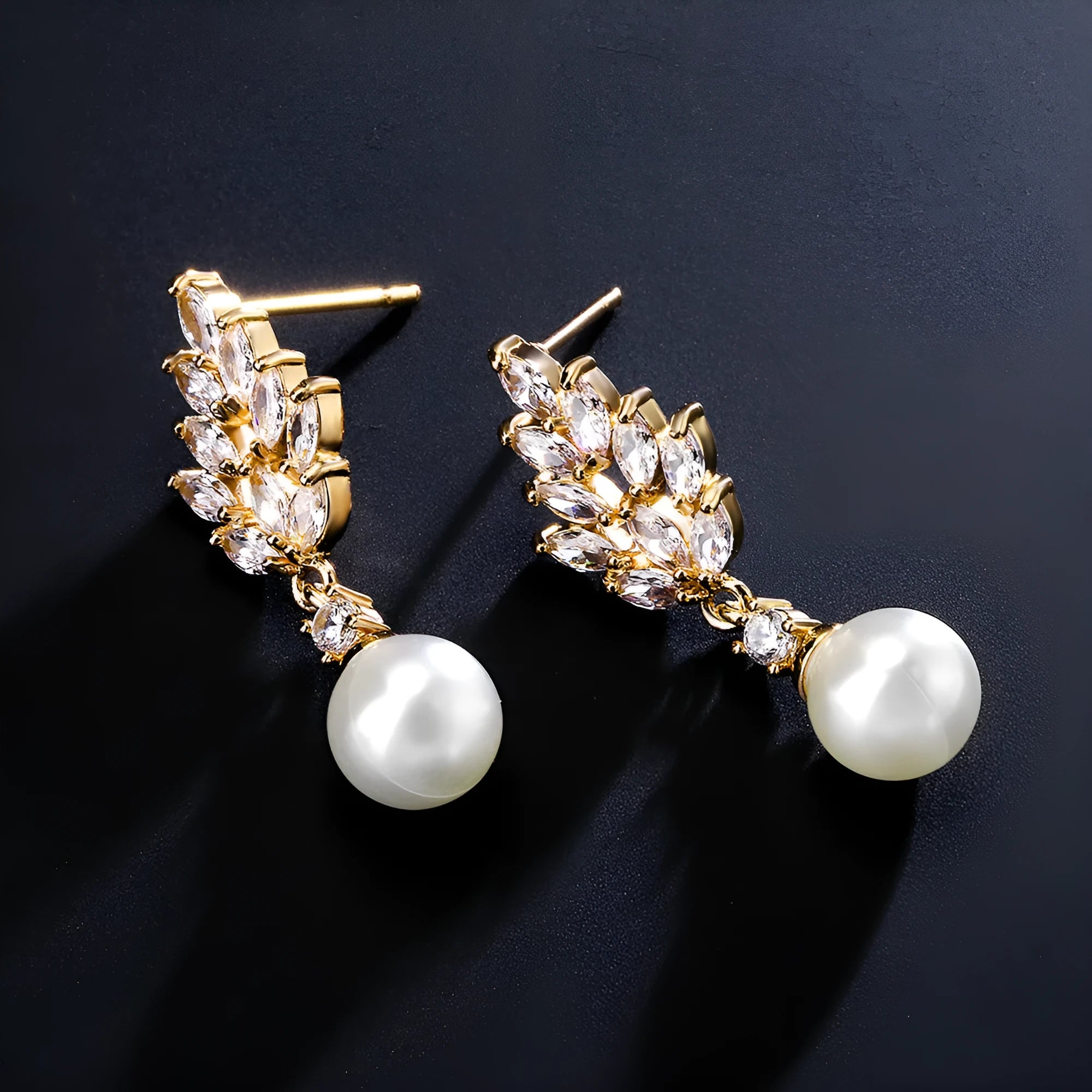 Geometric pearl earrings with micro inlaid zircon detailing and floral design in metallic plating