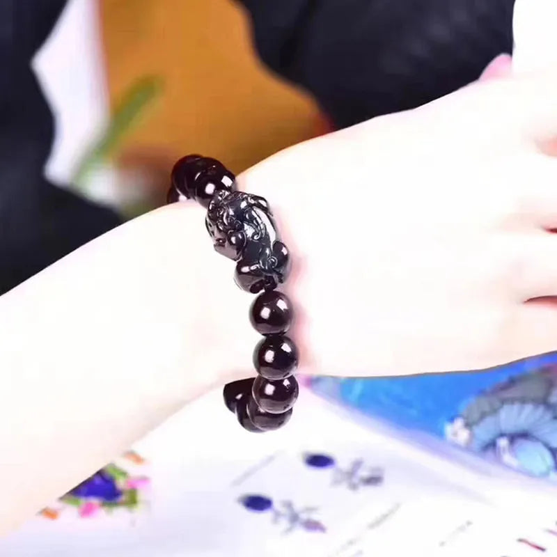 Natural ice colour eye obsidian crystal bracelet in unisex style with various bead sizes.