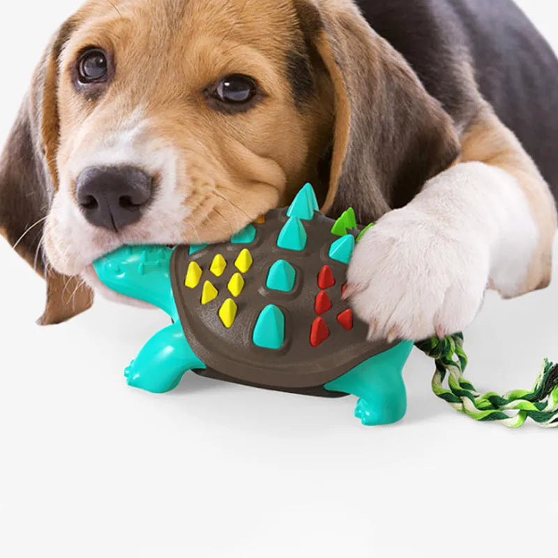 Natural rubber dog toothbrush chew toy with dinosaur knot tail design in assorted colour options