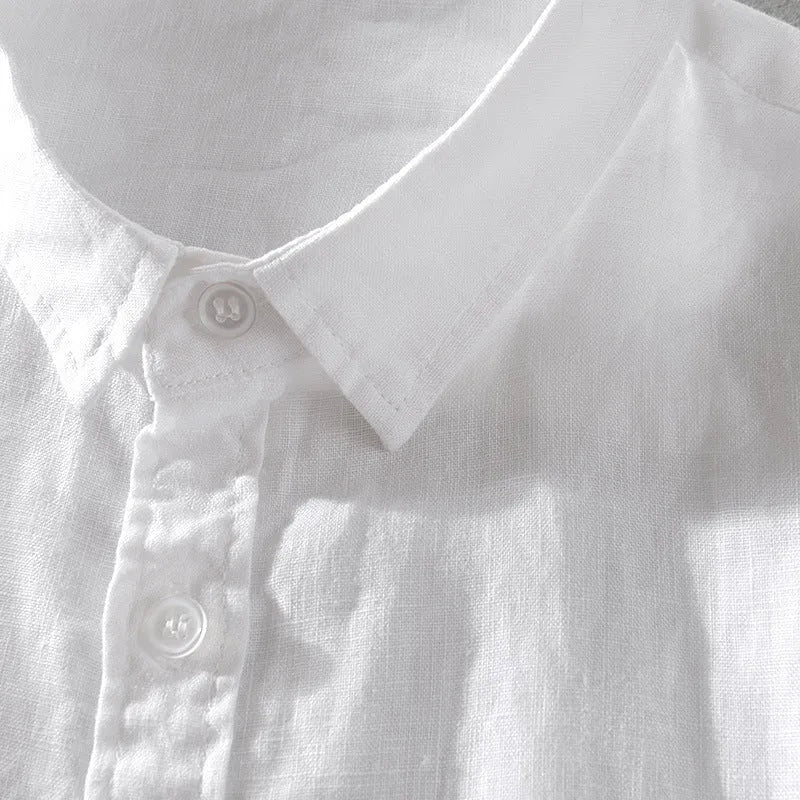 Men's solid colour short sleeve linen blend shirt in loose fit, shown in apricot colour.