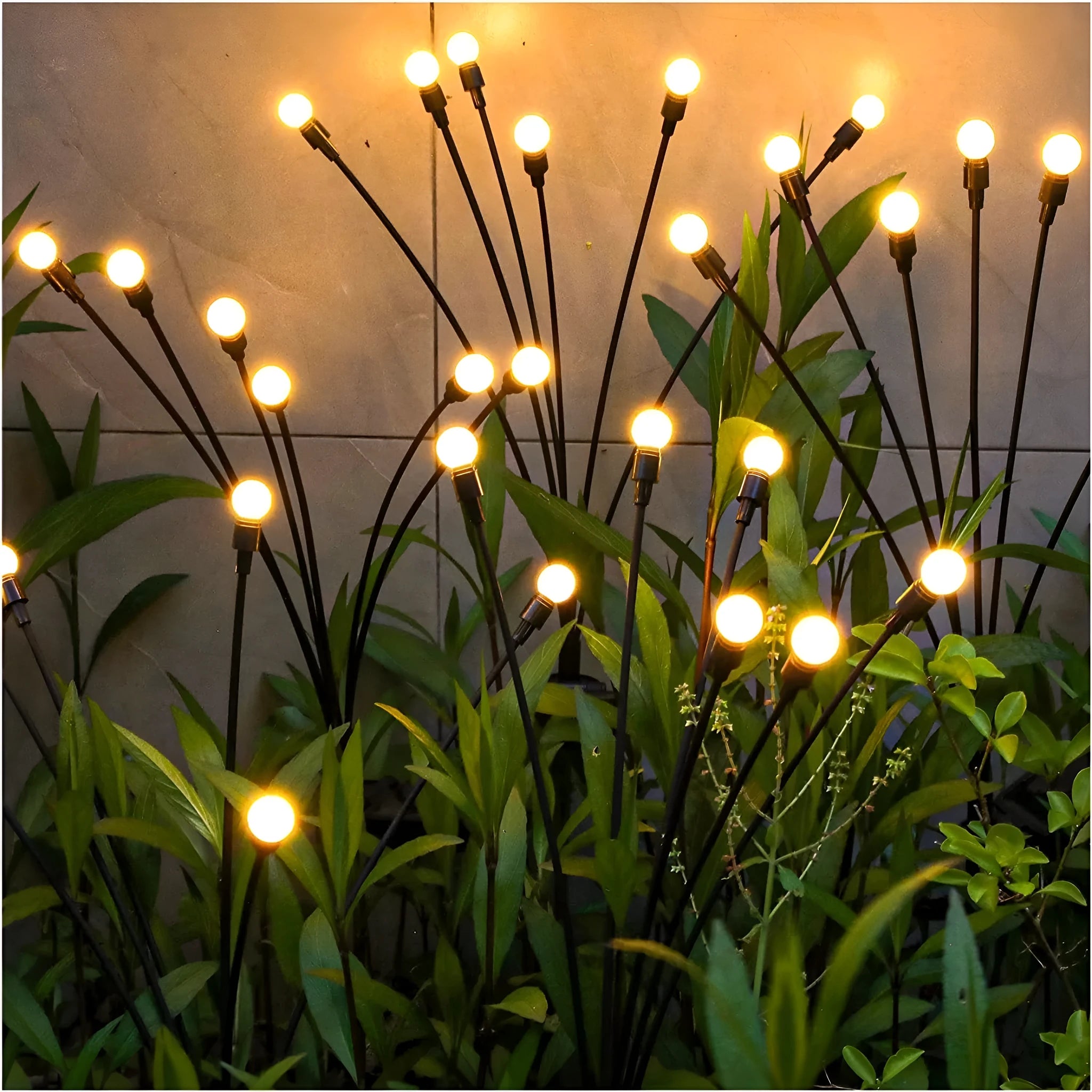 Solar-powered LED garden lamp with multiple light heads and ground plug stakes on a lawn