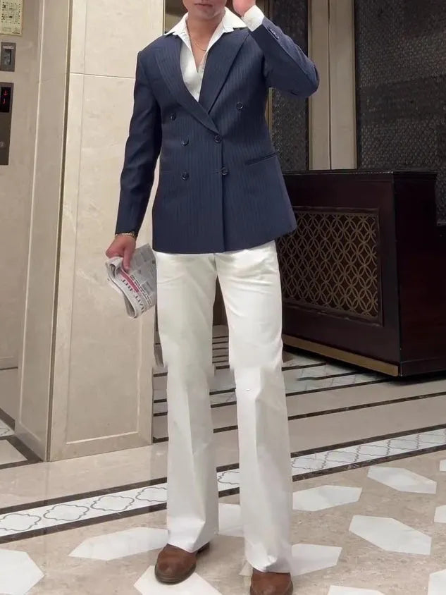 Men's classic striped double-breasted blazer on a hanger
