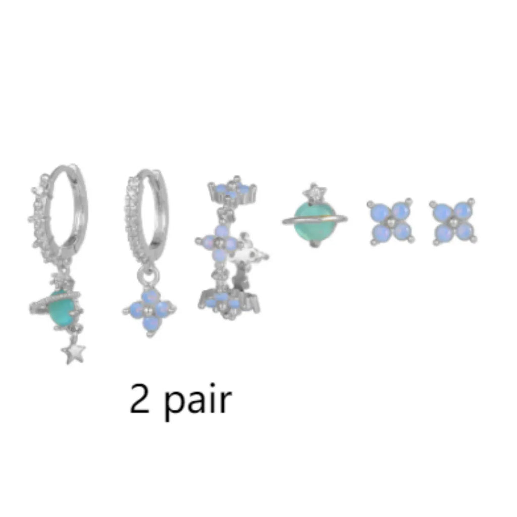 Gold and silver floral ear studs with zircon mosaic stones and geometric metal design