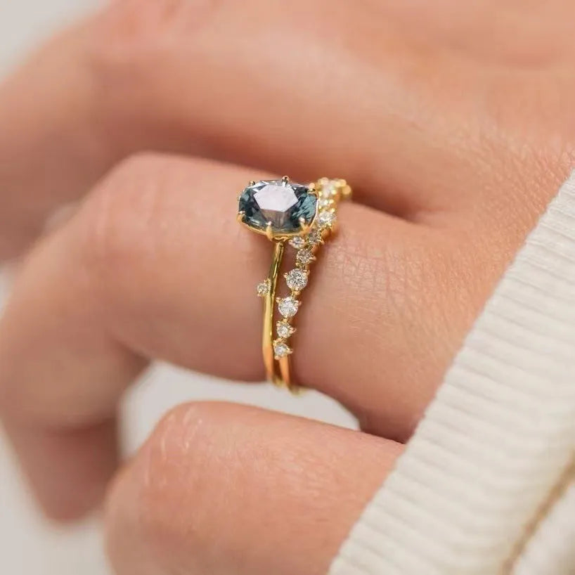 Gold plated flower shaped ring with green zircon stone in women's sizes UK 6 to 10