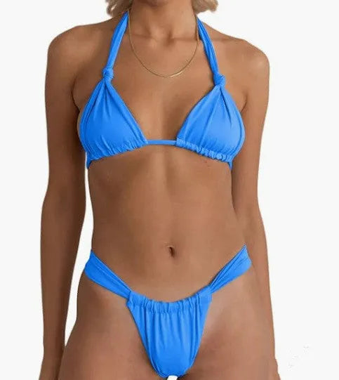 Women's pink pleated bikini with knotted front and split straps on a mannequin
