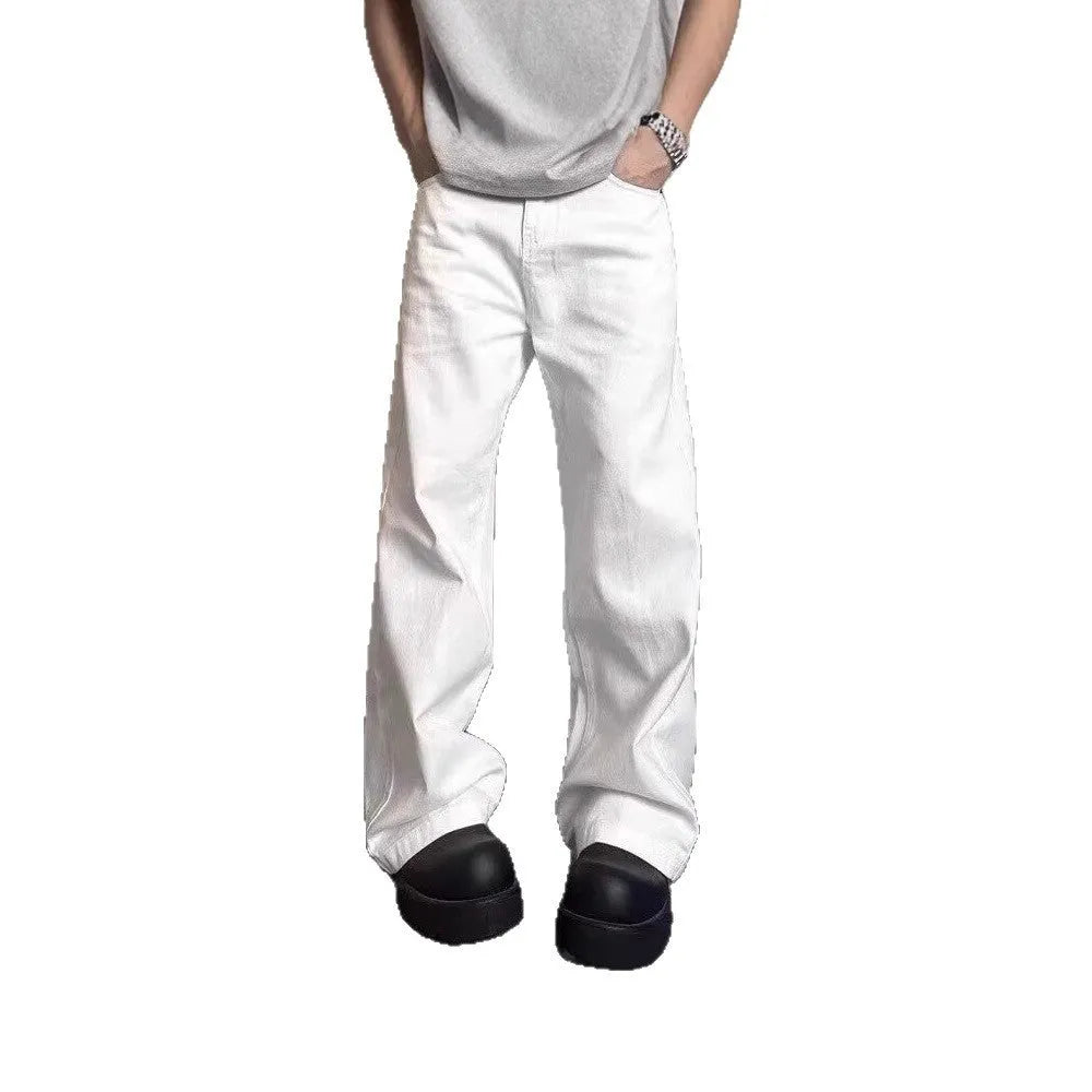 Men's straight-cut white wide-leg denim jeans with a mid waist and zipper fly