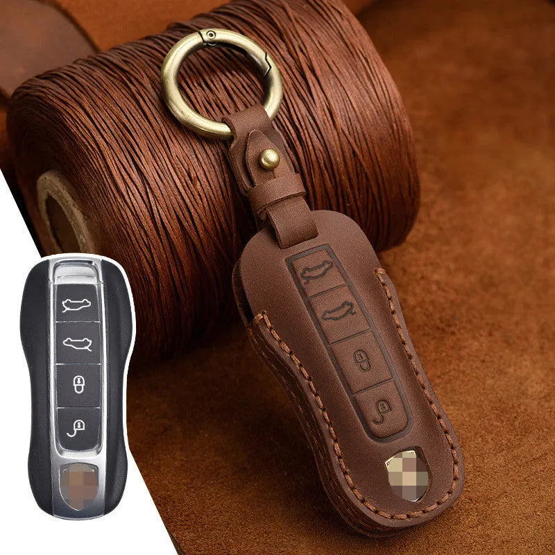 Retro style brown cowhide leather key cover with bag buckle for Porsche keys.