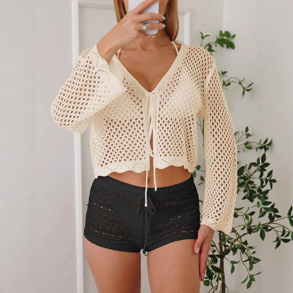 Women's apricot hollow woven cardigan blouse with bell sleeves, short length.