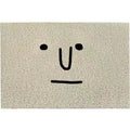 Square PVC floor mat with geometric pattern in Mr. Big Nose colour, shown on a home floor.