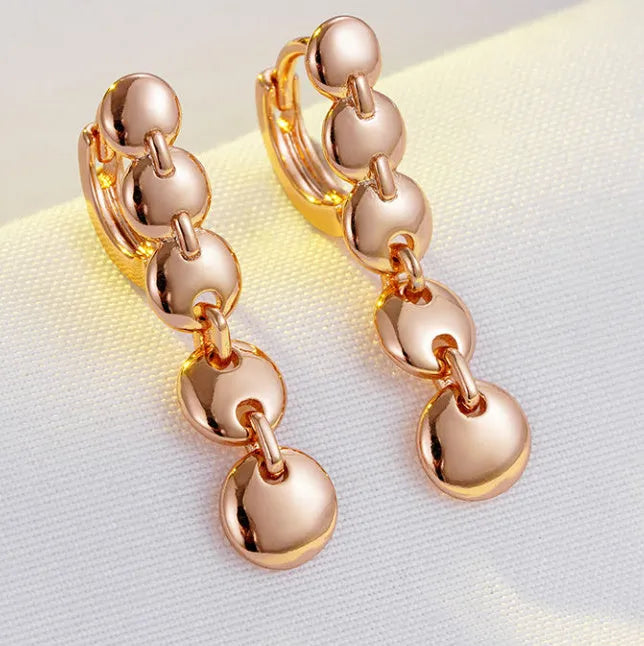 Gold retro woven circle earrings with geometric copper construction