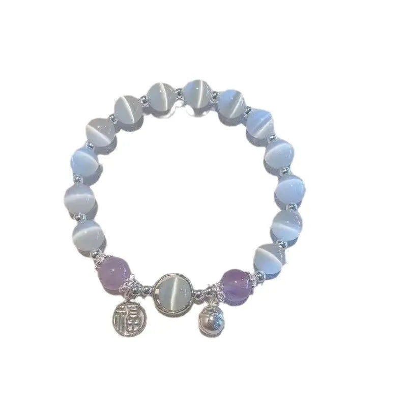 Women's manually crafted glass butterfly bracelet in drop shape with round elements