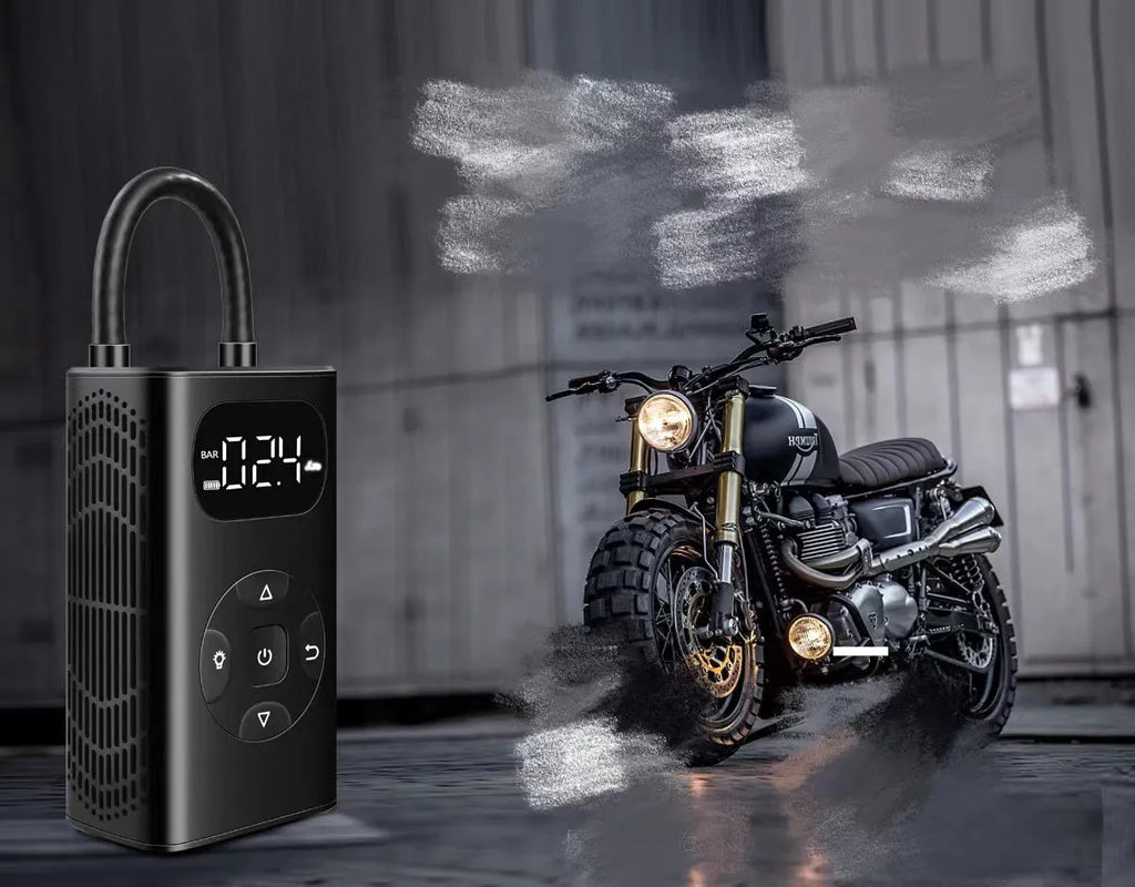 Black M09X portable power bank tyre inflator with digital display and 16cm air hose on a dark background.