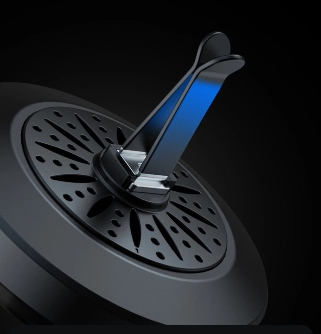 3D RGB car atmosphere light mounted on a car air vent, showing voice control and aromatherapy functions.