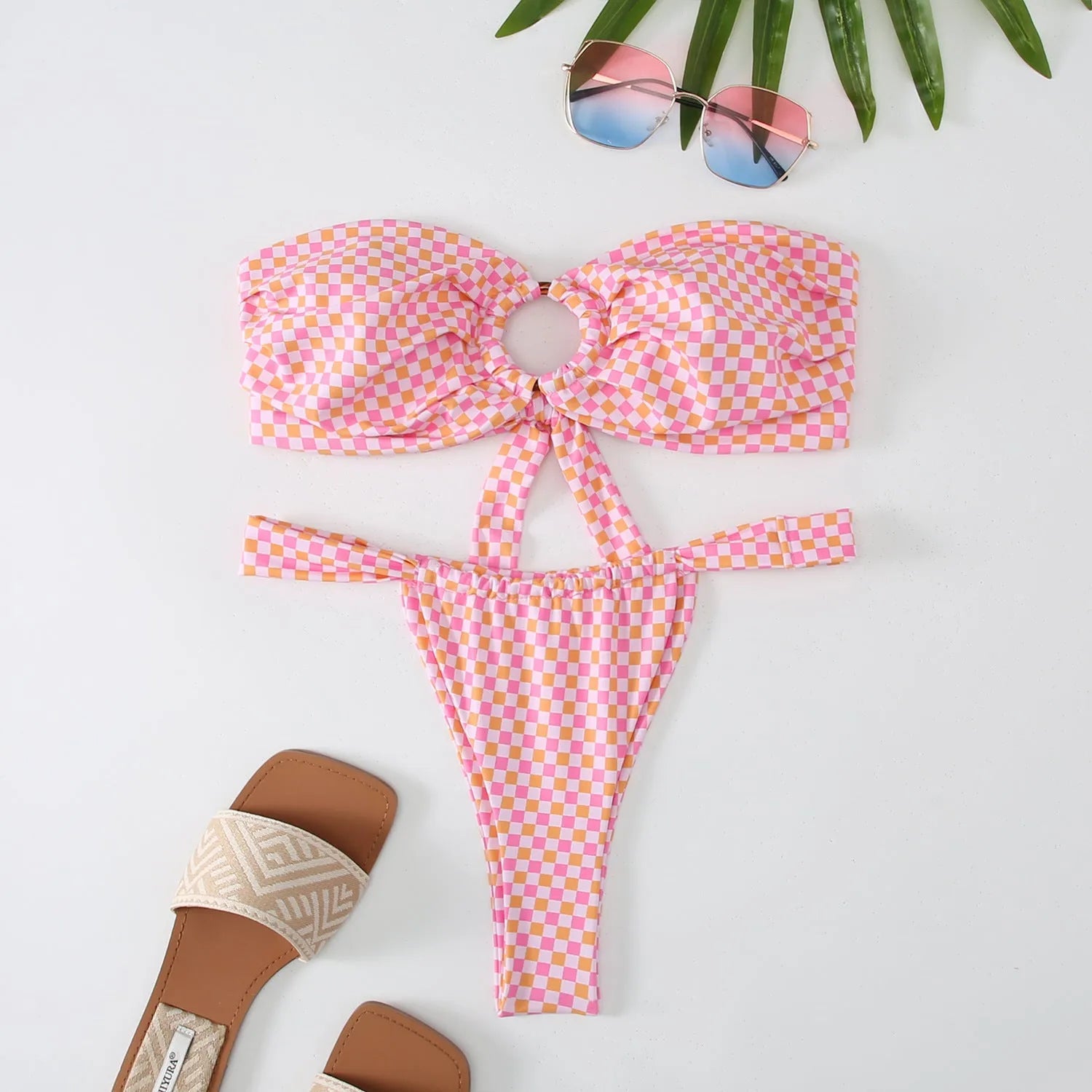 Women's floral printed ring bikini swimsuit with a sleeveless tube top and backless briefs.